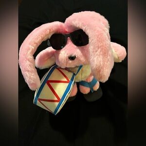 Pink Plush Energizer Bunny with Drum, flip flops, and Sunglasses.